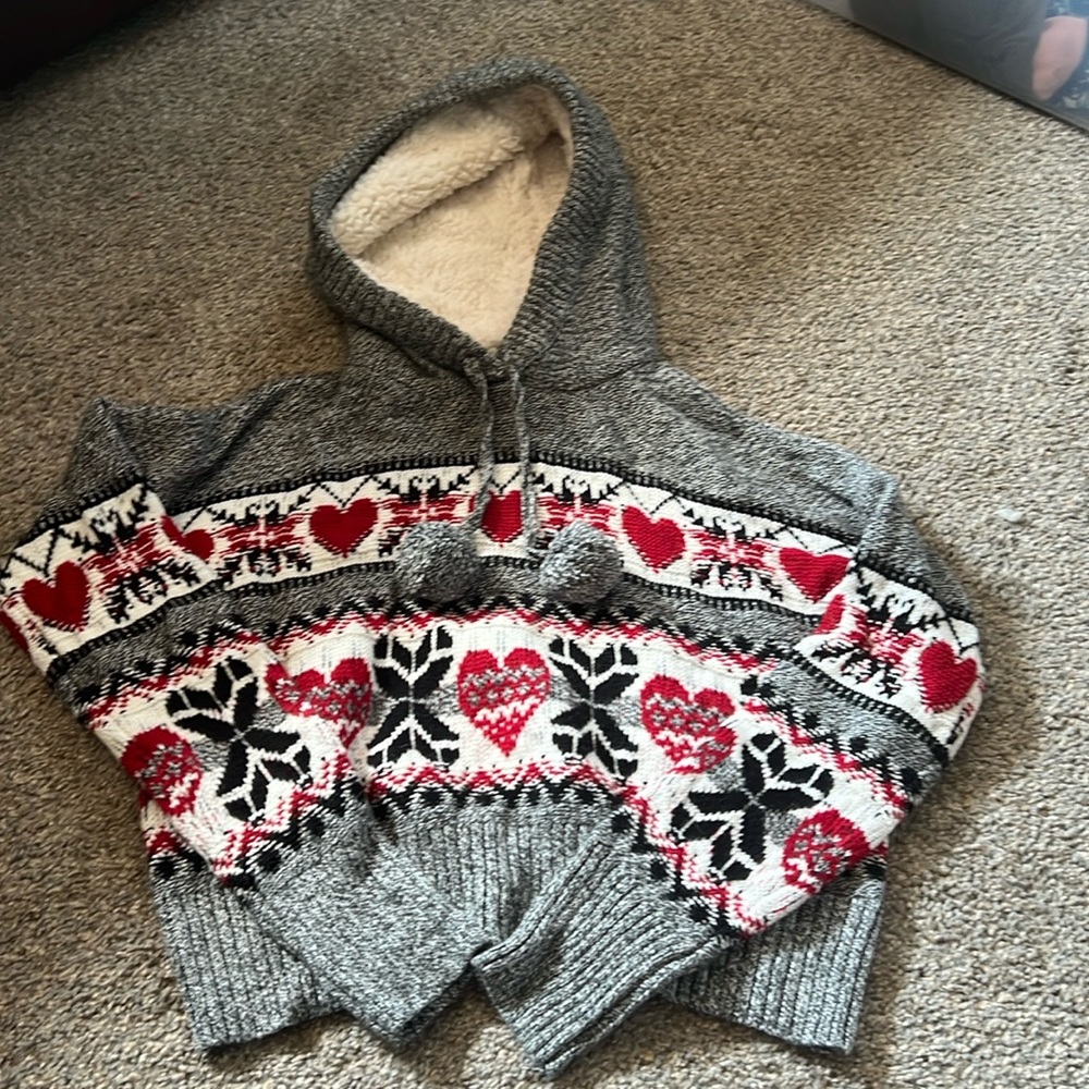 Yes Lola hoodie size medium. Red, black, white, and grey in color.